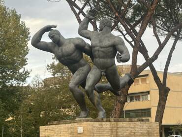 La corsa: i giganti del Villaggio Olimpico
